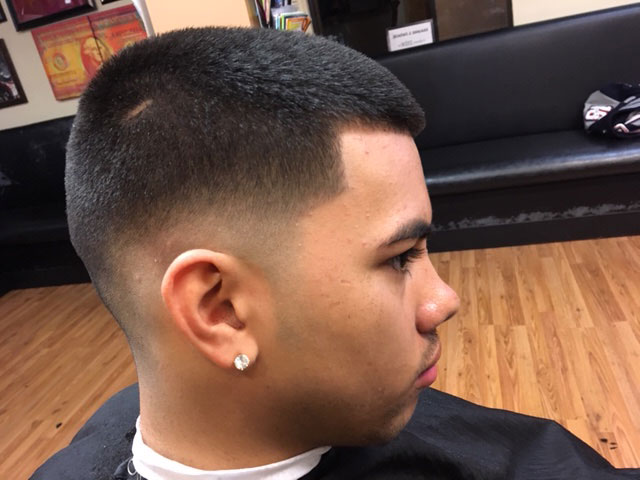 Sharp mid skin fade with crisp lineup